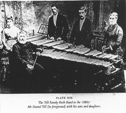 A photo of the family with their instrument(s)