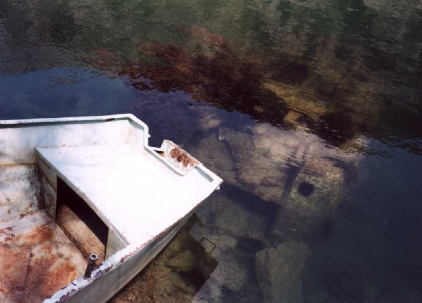  Boat and sunken car 